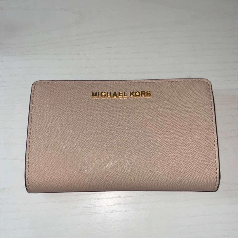 Authentic pink Michael Kors wallet